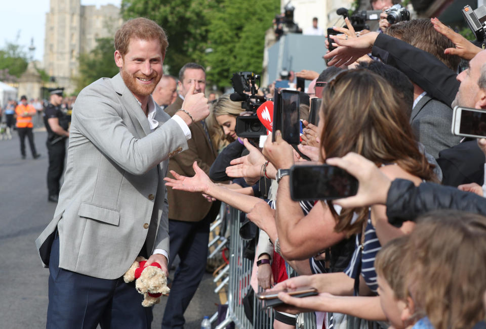 Prince Harry meets members of the public outside Windsor Castle on May 18, 2018, ahead of his wedding to Meghan Markle this weekend. (Photo: Jonathan Brady/pool via Reuters)