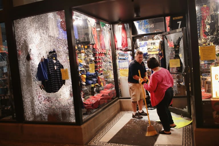 Dozens of business windows were smashed during protests Saturday over the acquittal of former St. Louis police officer Jason Stockley