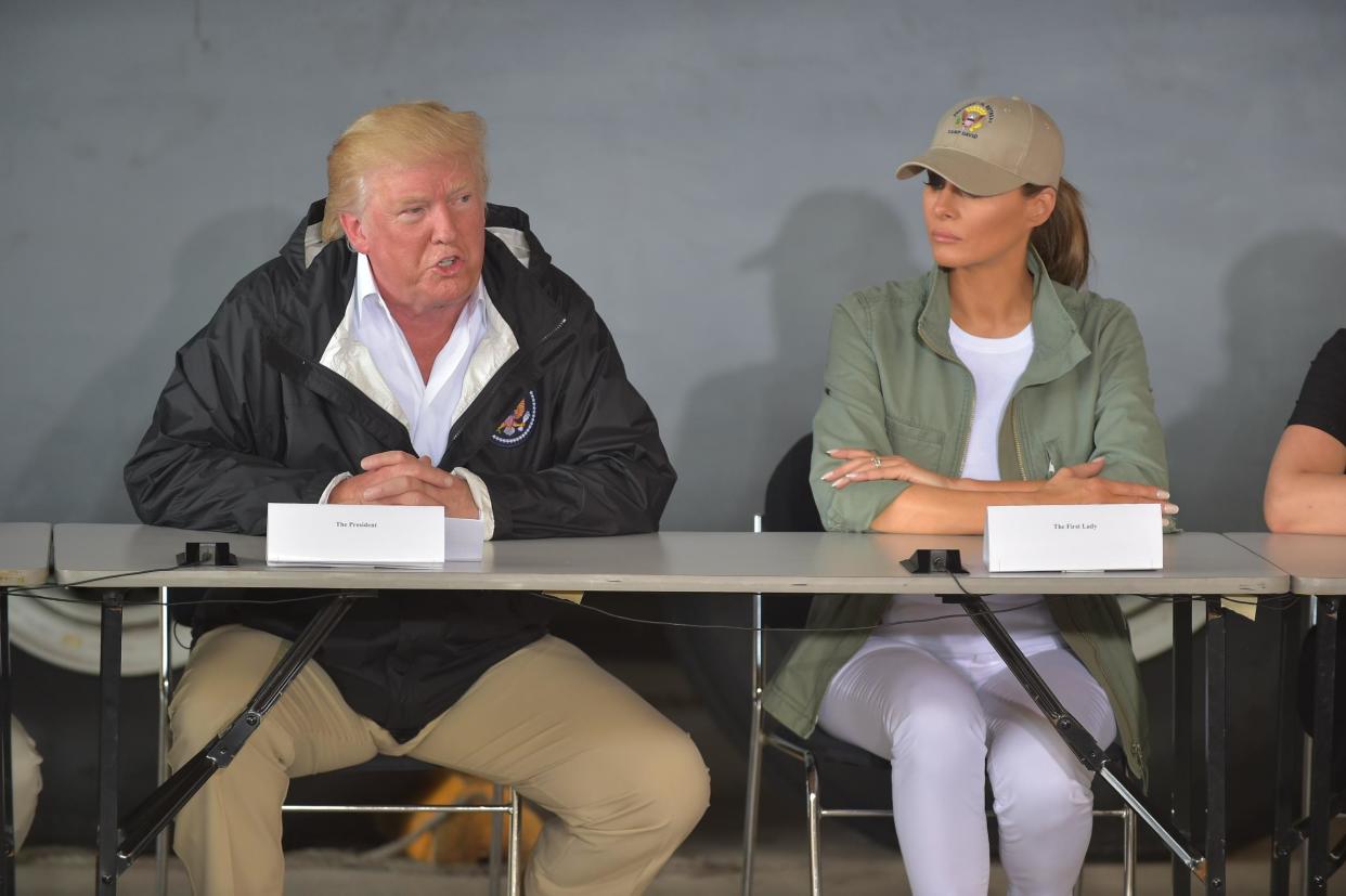 US President Donald Trump and First Lady Melania Trump attend a meeting with Puerto Rico Governor Ricardo Rossello: Getty