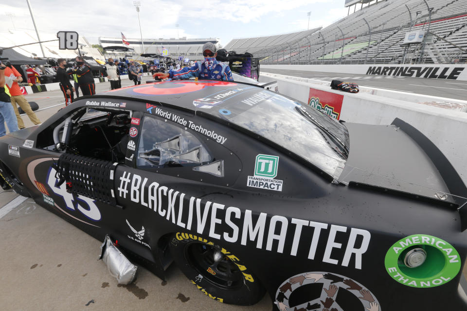 The car for driver Bubba Wallace has a Black Lives Matter logo as it is prepared for a NASCAR Cup Series auto race Wednesday, June 10, 2020, in Martinsville, Va. (AP Photo/Steve Helber)