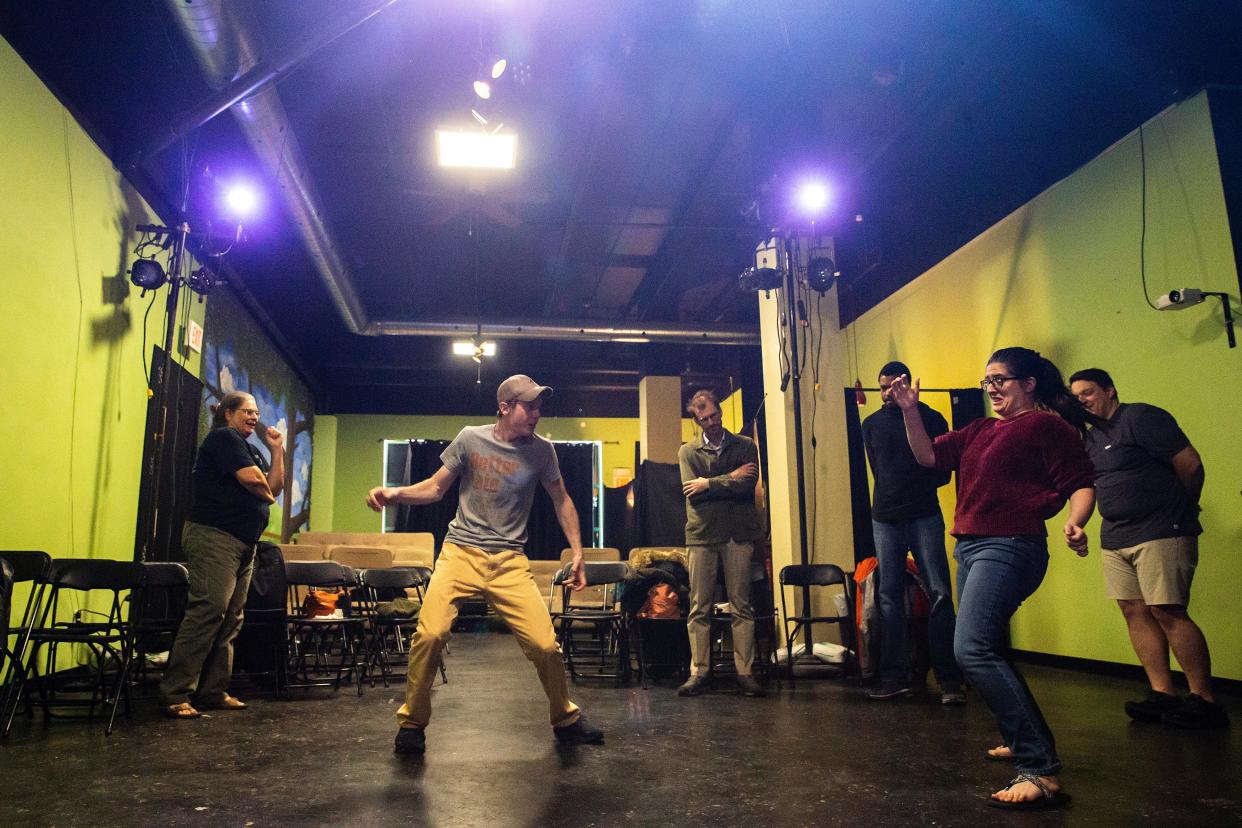 Dan Junis, left, and Rebecca Krause-Galoni of the Lady Franklyn improv troupe practice Oct. 26 at Willow Creek Theatre in Iowa City.