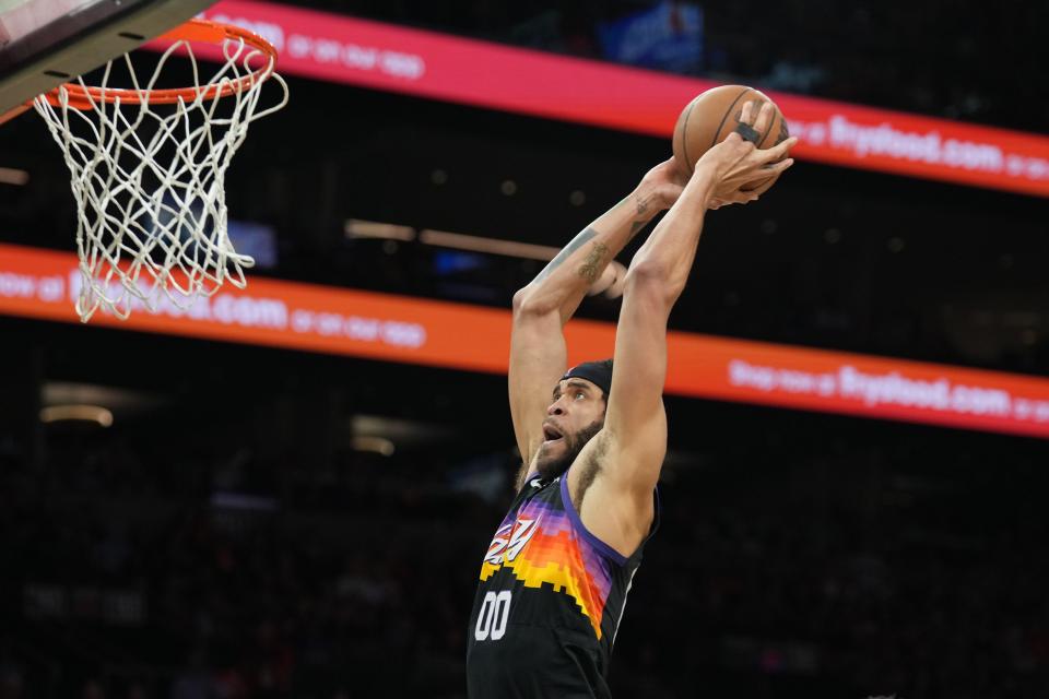 Phoenix Suns center JaVale McGee dunks against the New Orleans Pelicans during the second half of game one of the first round for the 2022 NBA playoffs at Footprint Center.