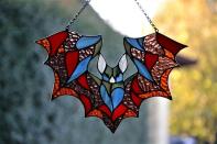 <p><strong>GlassstudioIC</strong></p><p>etsy.com</p><p><strong>$69.00</strong></p><p>Next up is a stained glass suncatcher you should totally splurge on this Halloween season. It's handmade and a piece you'll have for years to come.</p>