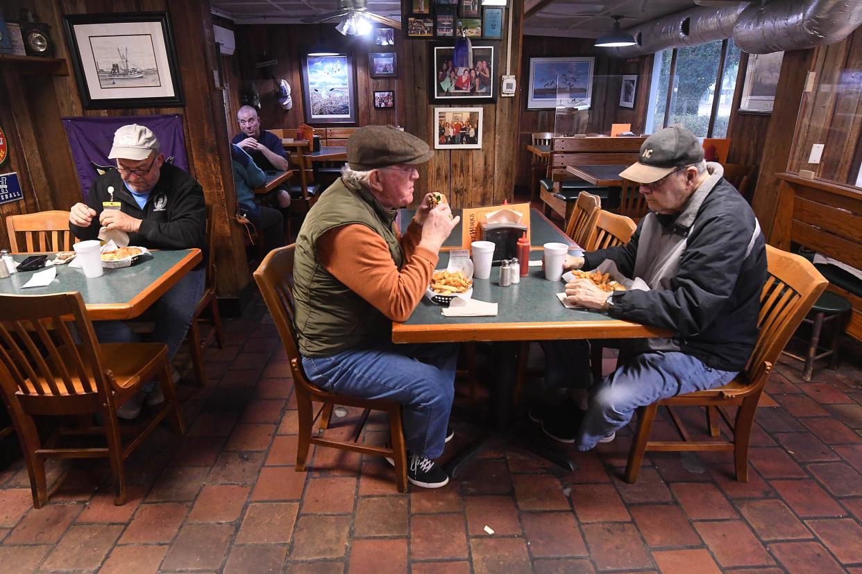 Patrons enjoy their meals at the Original Salt Works that was founded in 1973 in Wilmington, N.C. The current owner Bob Hubbard has owned the restaurant for 20 years. KEN BLEVINS/STARNEWS