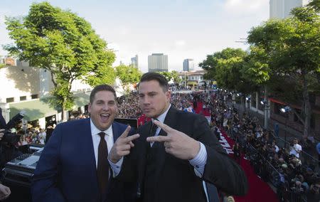 Cast members Jonah Hill (L) and Channing Tatum pose at the premiere of "22 Jump Street" in Los Angeles, California June 10, 2014. REUTERS/Mario Anzuoni