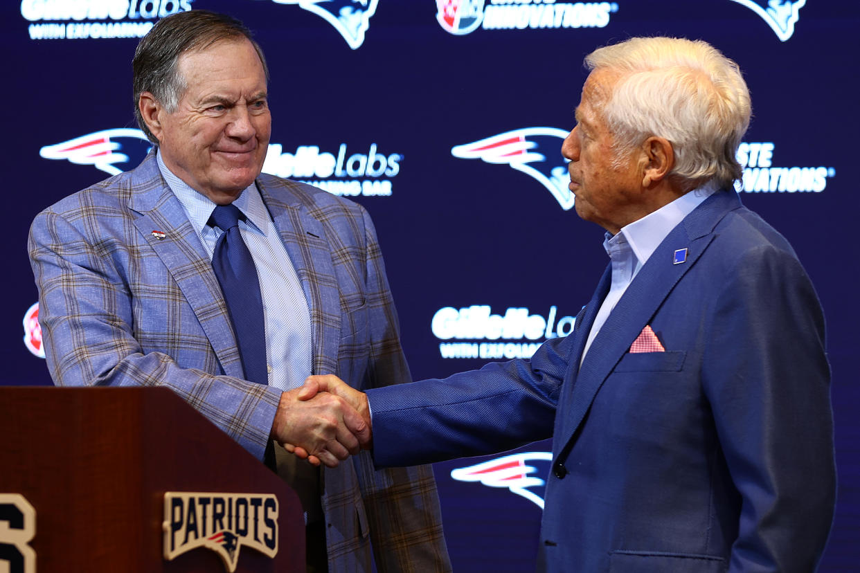 FOXBOROUGH, MASSACHUSETTS - JANUARY 11: Head coach Bill Belichick (L) of the New England Patriots shakes hands with owner Robert Kraft (R) during a press conference at Gillette Stadium on January 11, 2024 in Foxborough, Massachusetts. (Photo by Maddie Meyer/Getty Images)
