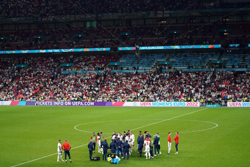 England players ahead of extra time during the UEFA Euro 2020 Final at Wembley Stadium, London. Picture date: Sunday July 11, 2021.