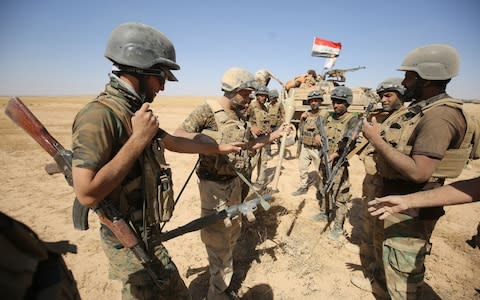 Iraqi forces pounded the Islamic State group in Tal Afar in a new assault - Credit: AHMAD AL-RUBAYE/AFP/Getty Images