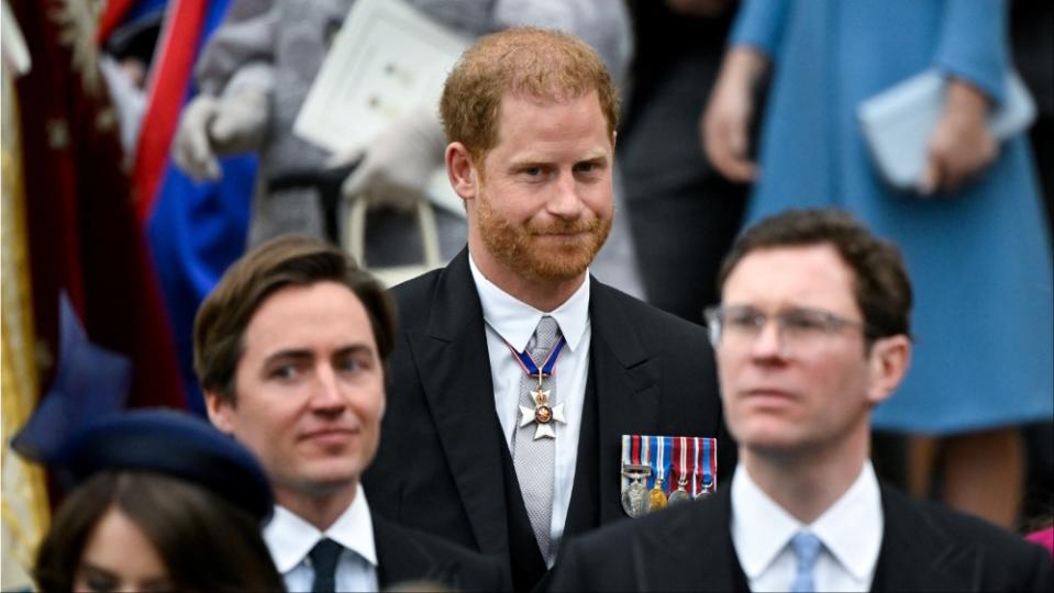 <span class="caas-xray-inline-tooltip"><span class="caas-xray-inline caas-xray-entity caas-xray-pill rapid-nonanchor-lt" data-entity-id="Prince_Harry,_Duke_of_Sussex" data-ylk="cid:Prince_Harry,_Duke_of_Sussex;pos:2;elmt:wiki;sec:pill-inline-entity;elm:pill-inline-text;itc:1;cat:Royalty;" tabindex="0" aria-haspopup="dialog"><a href="https://search.yahoo.com/search?p=Prince%20Harry,%20Duke%20of%20Sussex" data-i13n="cid:Prince_Harry,_Duke_of_Sussex;pos:2;elmt:wiki;sec:pill-inline-entity;elm:pill-inline-text;itc:1;cat:Royalty;" tabindex="-1" data-ylk="slk:Prince Harry;cid:Prince_Harry,_Duke_of_Sussex;pos:2;elmt:wiki;sec:pill-inline-entity;elm:pill-inline-text;itc:1;cat:Royalty;" class="link ">Prince Harry</a></span></span> entering Westminster Abbey for his father King Charles III’s coronation (Toby Melville – WPA Pool/Getty Images)