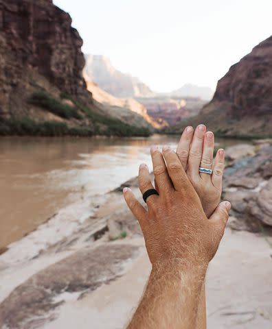 <p>Sarah Herron/Instagram</p> Sarah Herron and Dylan Brown show off their wedding bands after marrying at the Grand Canyon in August