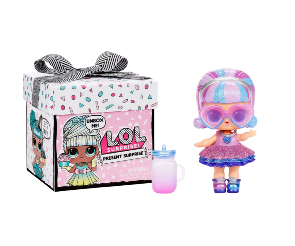 On the left is the packaged L.O.L Doll Surprise! box with a black and white ribbon on top. On the right is a pink and purple L.O.L doll with a small toy bottle.