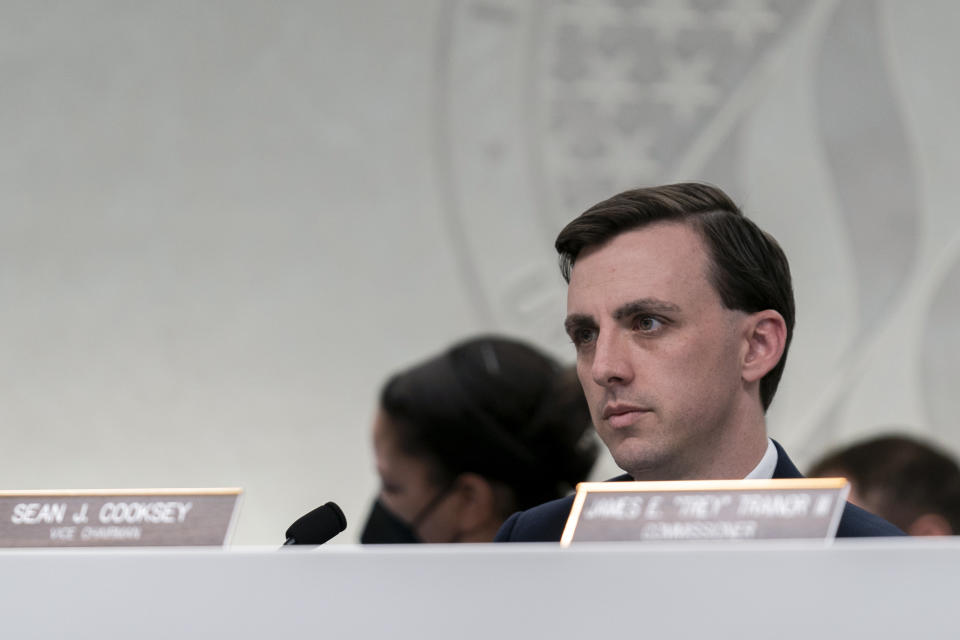 Vice Chairman of the Federal Election Commission Sean Cooksey listens during a Federal Election Commission public meeting on whether it should regulate the use of AI-generated political campaign advertisements, Thursday, Aug. 10, 2023, in Washington. (AP Photo/Stephanie Scarbrough)
