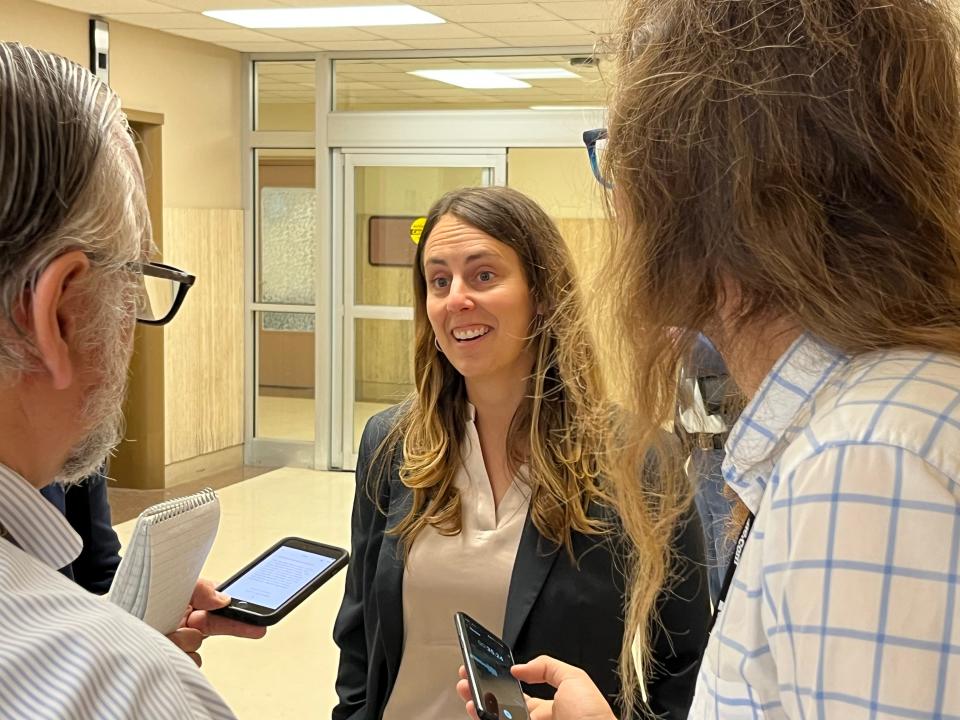 Sharon Brett, legal director of ACLU of Kansas, speaks with reporters at the Shawnee County Courthouse after a previous hearing on SB 180. This week's hearing had a ban on photography and audio recording that extended from the courtroom to the elevators on the third floor.