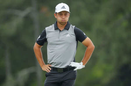 Golf - Masters - Augusta National Golf Club - Augusta, Georgia, U.S. - April 14, 2019 - Xander Schauffele of the U.S. looks at the pin on the 18th green. REUTERS/Brian Snyder