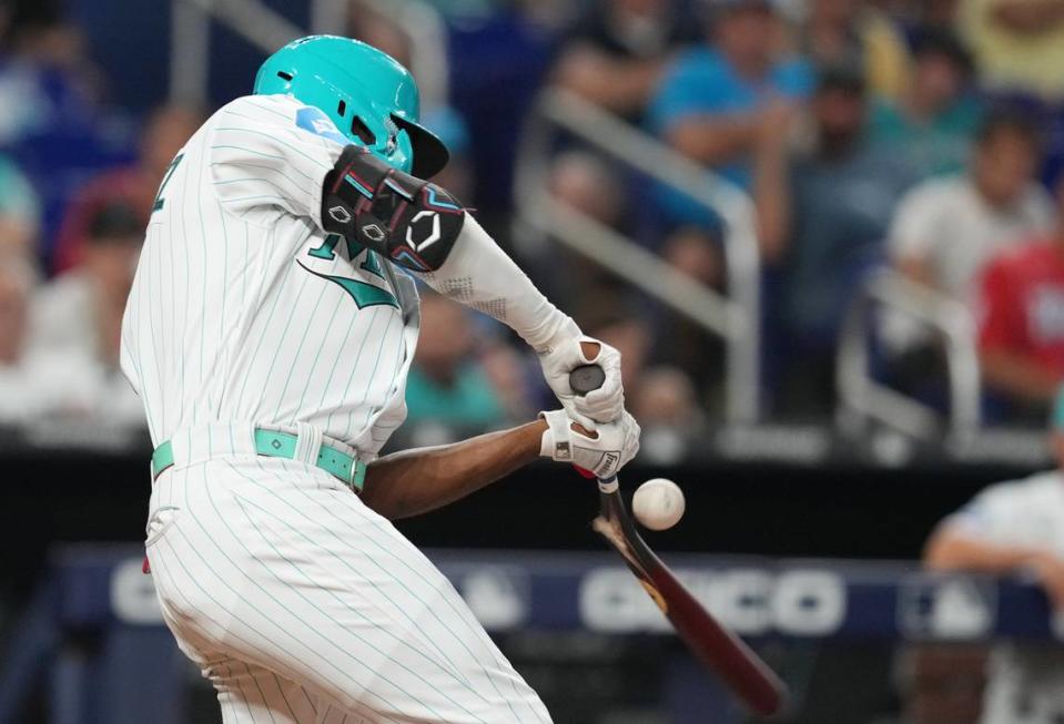 Miami Marlins right fielder Jesus Sanchez (7) breaks his bat in the fourth inning against the Colorado Rockies at loanDepot Park.