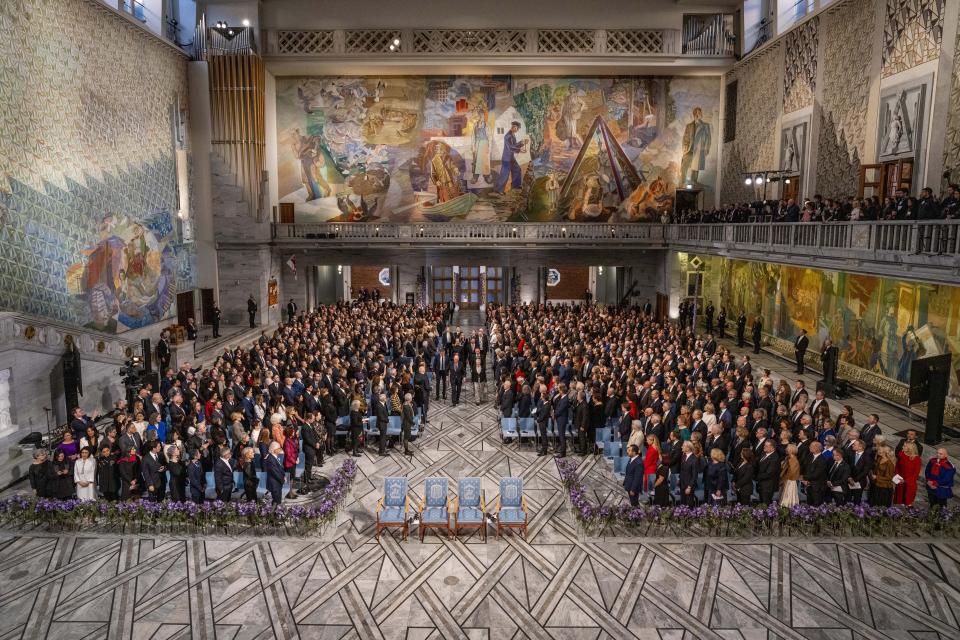 Norway's King Harald, Queen Sonja, Crown Prince Haakon and Crown Princess Mette-Marit arrive for the awarding of the Nobel Peace Prize for 2023 in Oslo City Hall, Oslo, Norway, Sunday, Dec. 10, 2023. The children of imprisoned Iranian activist Narges Mohammadi are set to accept this year’s Nobel Peace Prize on her behalf. Mohammadi is renowned for campaigning for women’s rights and democracy in her country. (Fredrik Varfjell/NTB via AP)