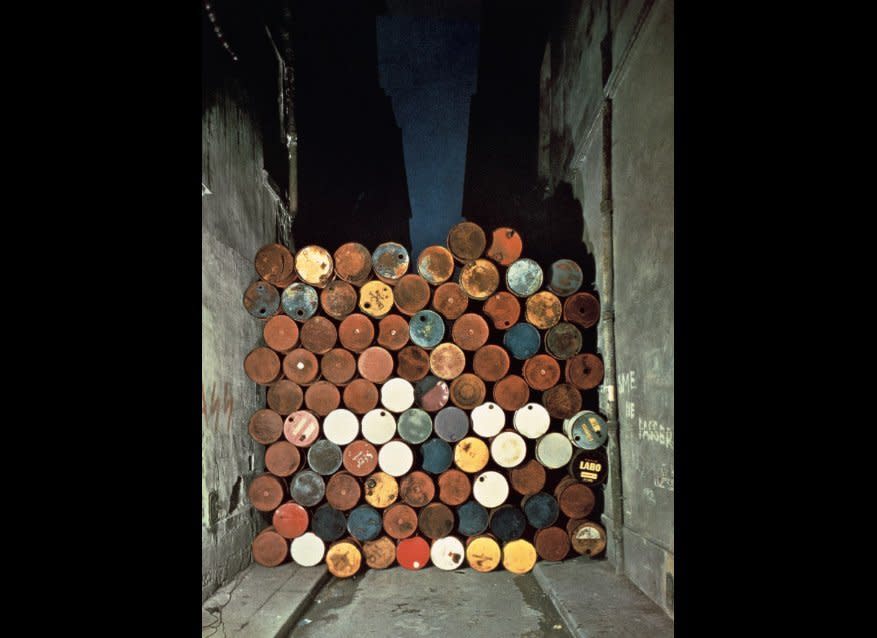 Jean-Dominique Lajoux  Caption: Christo  "Wall of Oil Barrels, Iron Curtain, Rue Visconti, Paris 1961-62"  (June 27, 1962) 240 oil barrels  4.3 x 3.8 x 1.7 m (14 x 13 x 5 ½ ft.)