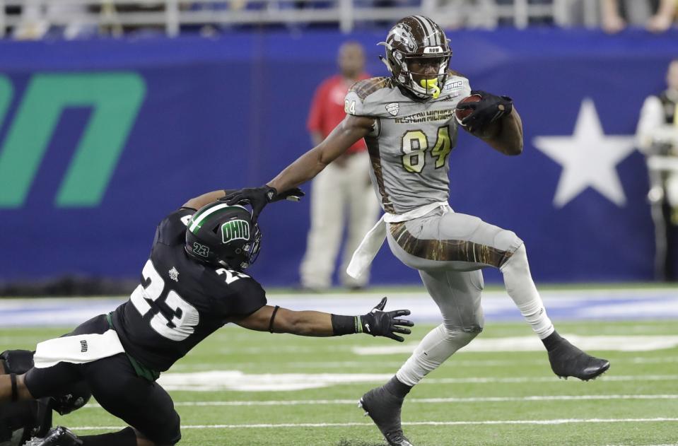 Western Michigan’s Corey Davis, right, is our top wide receiver for the 2017 NFL draft. (AP)