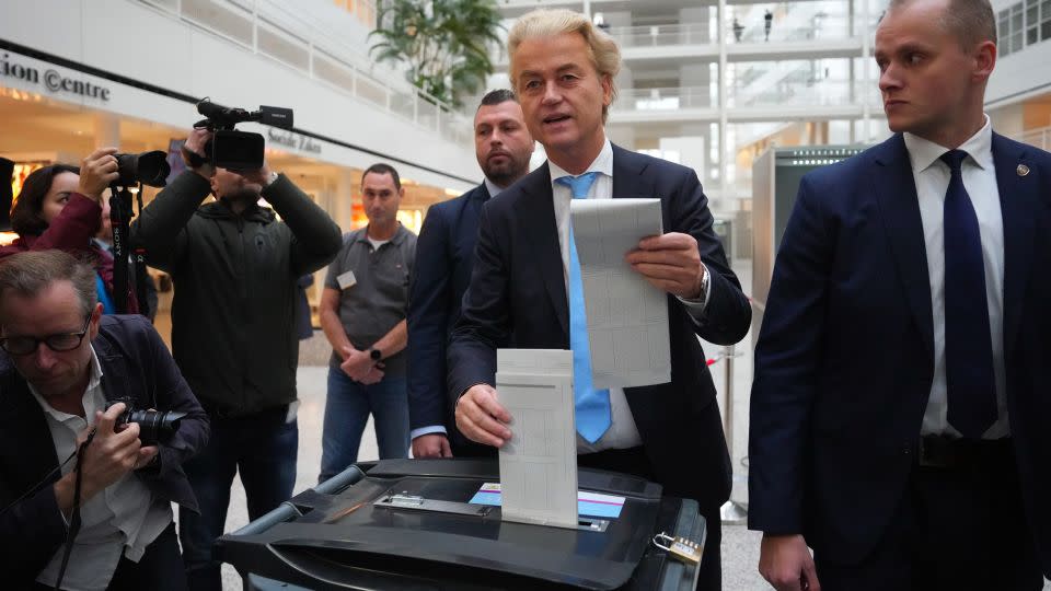 Wilders (center) casts his vote in the Dutch general election on Wednesday. - Carl Court/Getty Images