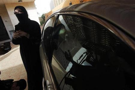 A female Saudi motorist speaks to the media after driving her vehicle in defiance of the ban on driving in Riyadh June 22, 2011. REUTERS/Fahad Shadeed/Files