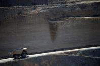 FILE PHOTO: A mining truck takes ore from the open-pit mine at the MP Materials rare earth mine in Mountain Pass