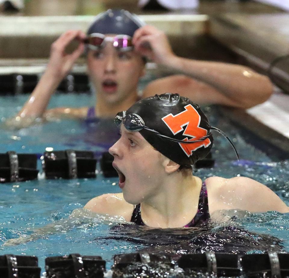 Marlington's Claire Cox flashes a look of disbelief after placing third in the girls 100 yard freestyle with a time of 52.10 seconds during the Division II State Swimming Championship at CT Branin Natatorium, Friday, Feb. 25, 2022, in Canton, Ohio. [Jeff Lange/Beacon Journal]