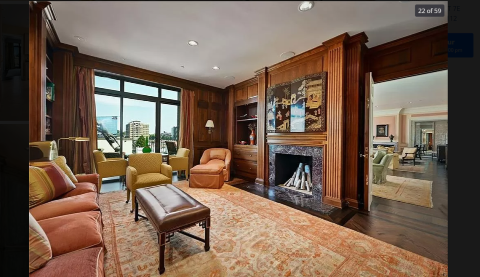 The library of 433 Ward Parkway, Unit 7E. This Kansas City penthouse overlooking the Plaza is listed for $4.4 million. Screenshot from Zillow. March 7, 2024.