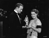 <p>Conrad Nagel is presenting the Canadian actress Norma Shearer an Oscar for her role in <em>The Divorcee</em>. She was the first actress to be nominated for five Academy Awards, and built up an impressive filmography before her 1942 retirement.</p>