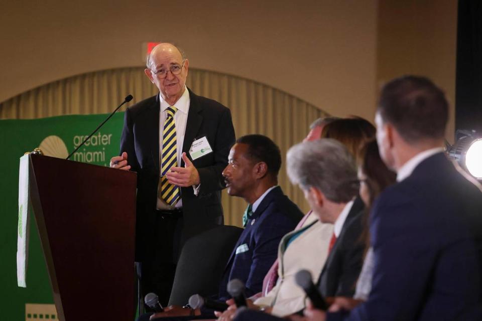 Michael Lewis, publisher and editor of Miami Today, moderates the panel during a Trustee Luncheon hosted by Greater Miami Chamber of Commerce to talk with leaders in higher education about adjusting to a post-pandemic world on Wednesday, April 5, 2023, at the Jungle Island Bloom Ballroom.