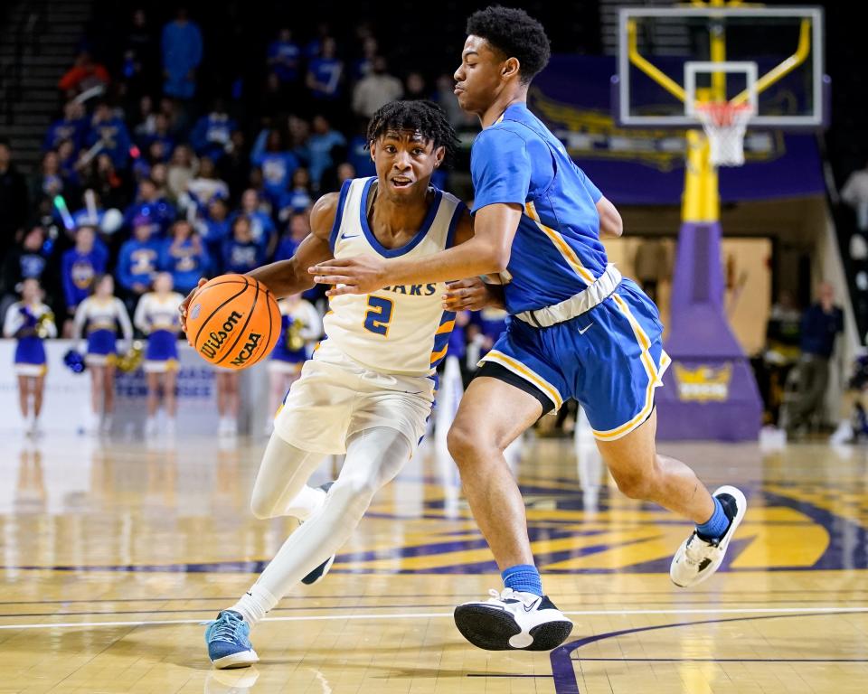 Clarksville Academy's Trae Rideau (2) is guarded by Goodpasture's King Keary (11) during the first quarter of a DII-A semifinal game at the Hooper Eblen Center in Cookeville, Tenn., Thursday, March 2, 2023.
