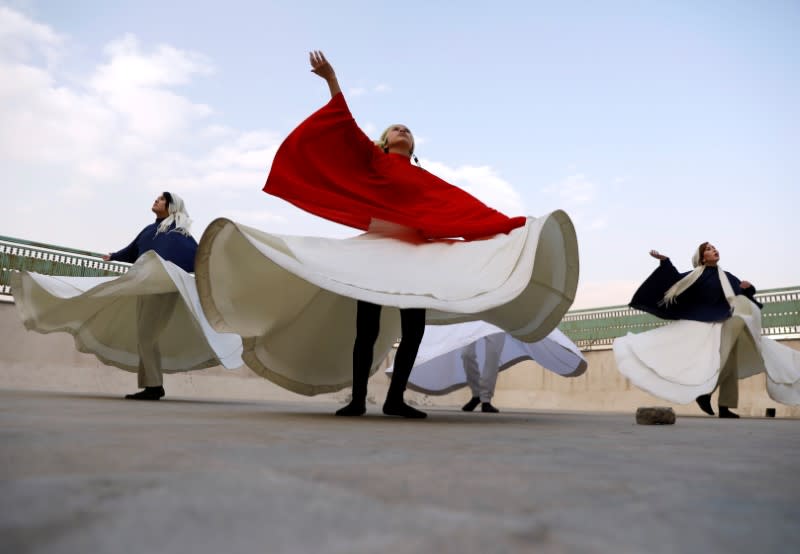 Mirzaie, founder of a Sama Dance group and her teammates dance in Kabul