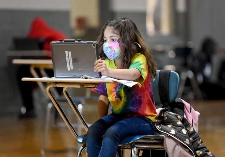 Jan. 19: Christina Pagan, 7, does her school work at the Olivet Boys and Girls Club in Reading, Pennsylvania. (Getty Images)