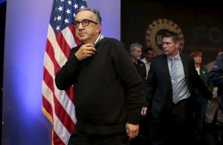 Fiat Chrysler Automobiles (FCA) CEO Sergio Marchionne leaves a news conference after announcing a tentative agreement with the United Auto Workers (UAW) in Detroit, Michigan, September 15, 2015. REUTERS/Rebecca Cook