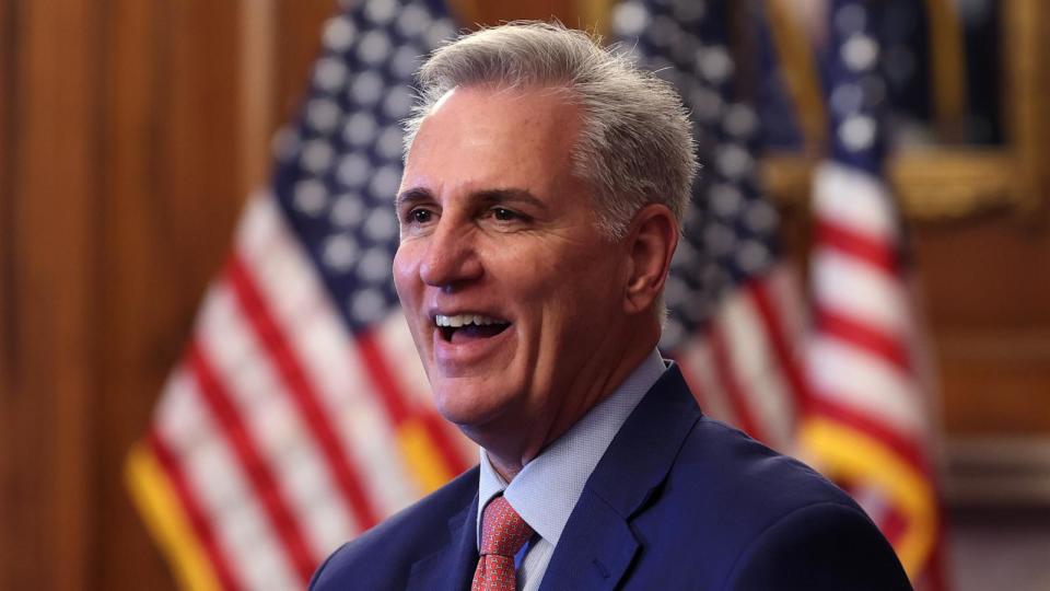 PHOTO: Former Speaker of the House Kevin McCarthy looks on while holding a photo line for Congressional staff on his last day at the Capitol, Dec. 14, 2023. (Kevin Dietsch/Getty Images)