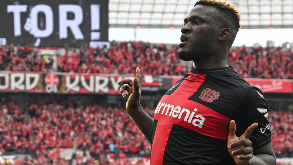 Victor Boniface celebrates scoring for Bayer Leverkusen