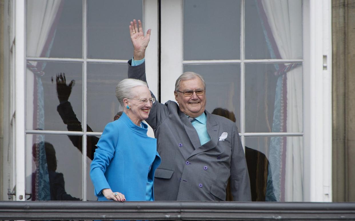  Denmark's Queen Margrethe and Prince Henrik wave from the balcony during Queen Margrethe's 76th birthday celebration at Amalienborg Palace in Copenhagen - REUTERS