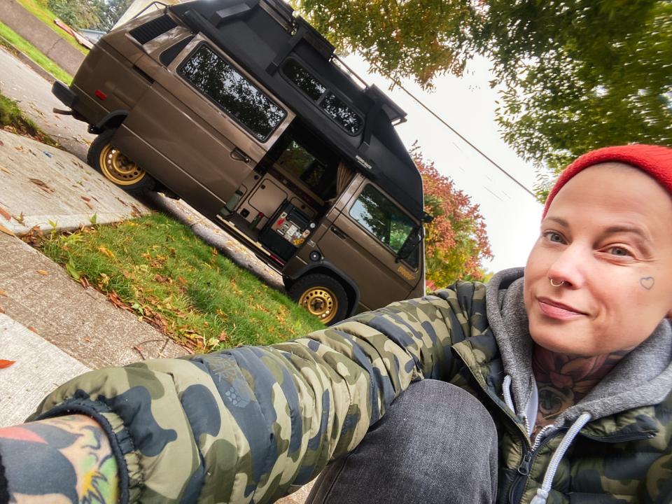 A selfie of freelancer Karla Margeson with her brown van.