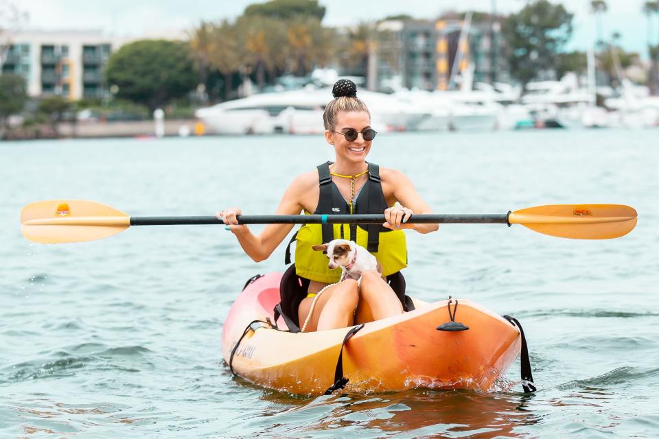 Rachel McCord escapes the L.A. heat by kayaking with her puppy on Saturday.