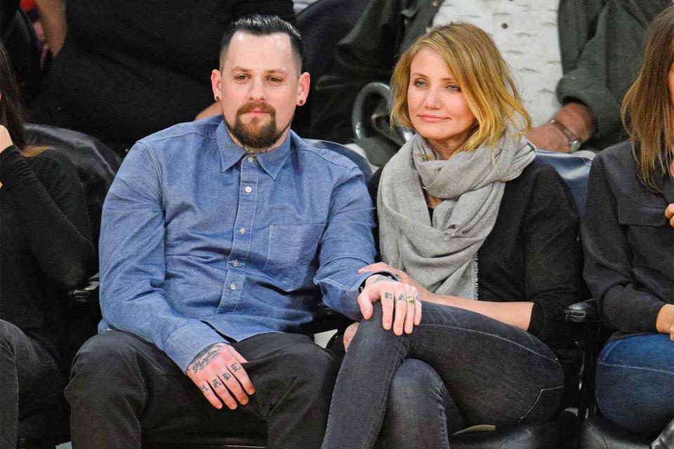 LOS ANGELES, CA - JANUARY 27: Benji Madden (L) and Cameron Diaz attend a basketball game between the Washington Wizards and the Los Angeles Lakers at Staples Center on January 27, 2015 in Los Angeles, California. (Photo by Noel Vasquez/GC Images)