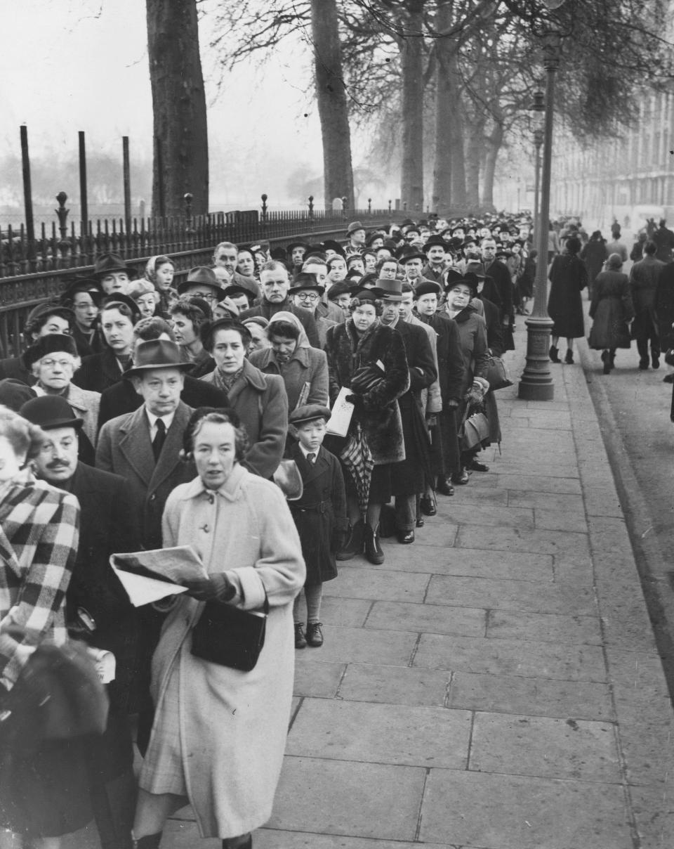 12th February 1952:  A section of the queue which formed in order to file past the body of King George VI as it lay in state at Westminster Hall in London.  (Photo by William Vanderson/Fox Photos/Getty Images)