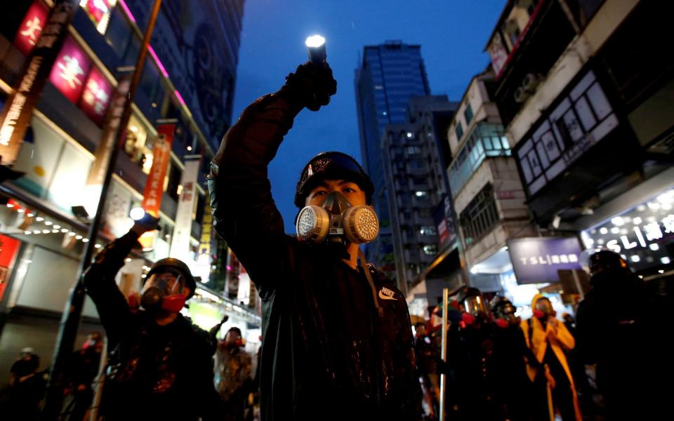 Protesters have warned that the new law will "end Hong Kong" - REUTERS