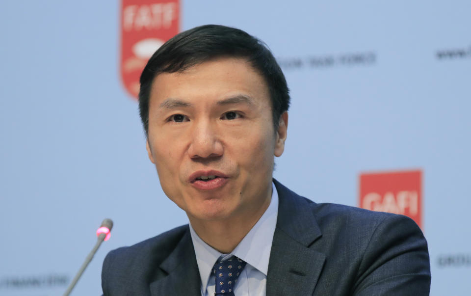 Financial Action Task Force (FATF) President Xiangmin Liu speaks during a media conference at the OECD headquarters in Paris, Friday, Oct. 18, 2019. FATF a international monitoring agency has given Pakistan four months to prove it is fighting terrorism financing and money laundering or it could be put on a damaging global blacklist. (AP Photo/Michel Euler)