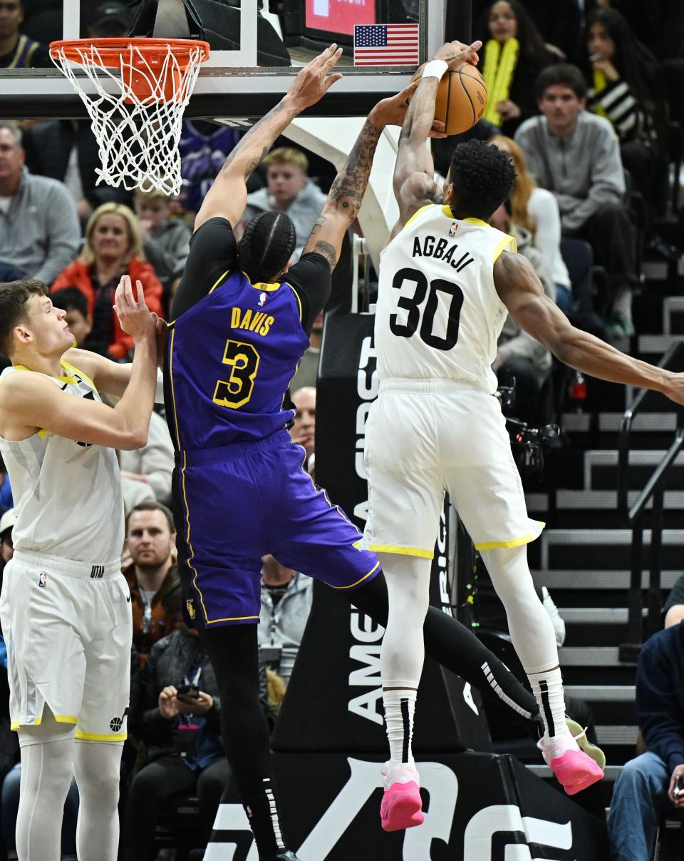 Los Angeles Lakers forward Anthony Davis (3) is blocked by Utah Jazz guard <a class="link " href="https://sports.yahoo.com/nba/players/6704" data-i13n="sec:content-canvas;subsec:anchor_text;elm:context_link" data-ylk="slk:Ochai Agbaji;sec:content-canvas;subsec:anchor_text;elm:context_link;itc:0">Ochai Agbaji</a> (30) as Utah and Los Angeles play at the Delta Center in Salt Lake City on Saturday, Jan. 13, 2024. | Scott G Winterton, Deseret News