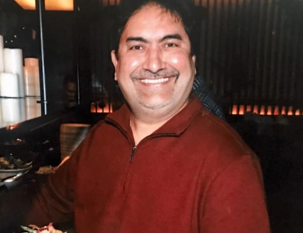 Kanaiya Gandhi, a Brampton man, developed COVID-19 symptoms in late December after an outbreak at the plant where he worked in York Region. About eight to 12 workers out of about 40 at the Woodbridge plant tested positive for COVID-19. He died on Feb. 4, 2021 at the age of 58. (Submitted by Radhika Gandhi  - image credit)