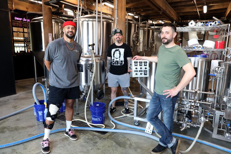 Andy Galagarza, left, Matthew Williams and brewer Kevin Glessing, co-founders of Simple Motive Brewing in Yonkers, May 30, 2023.