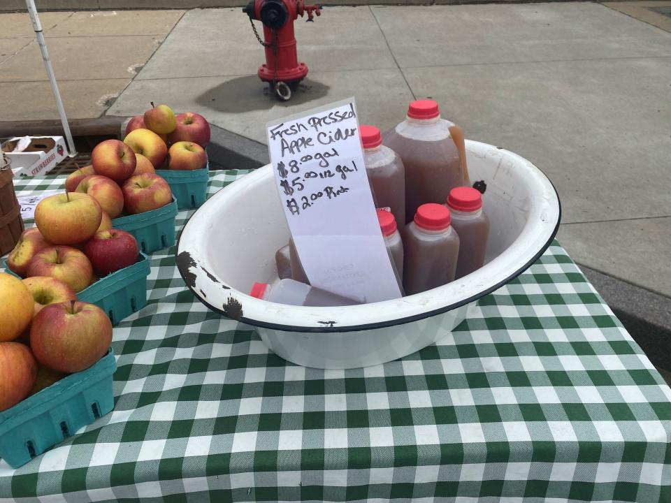 Woolf Farms sells fresh apple cider at the Canton Farmers Market in downtown Canton.