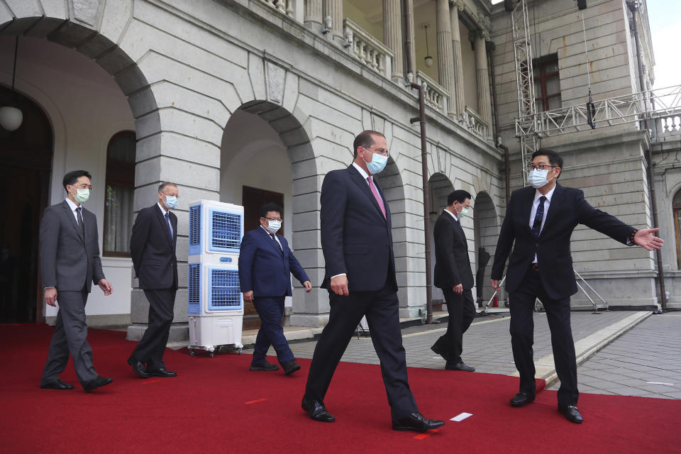 U.S. Health and Human Services Secretary Alex Azar, third from right, arrives at a memorial for former Taiwanese President Lee Teng-hui in Taipei, Taiwan, Wednesday, Aug. 12, 2020. Wednesday is the last day of Azar's schedule during the highest-level visit by an American Cabinet official since the break in formal diplomatic ties between Washington and Taipei in 1979. (Wang Teng-yi/Pool Photo via AP)