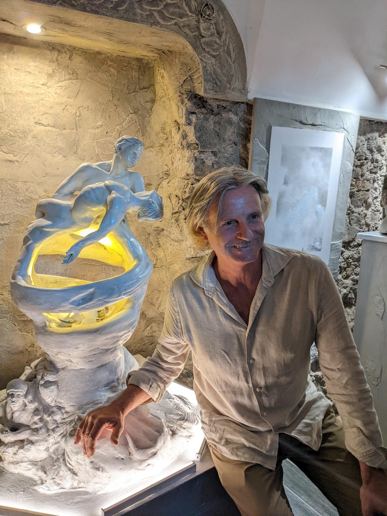 Franco Palmentieri with a prototype of the statue he is planning to make with help from the Bee Cave Arts Foundation.