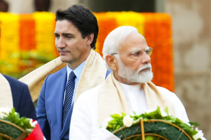 <cite>2023年9月10日，印度德里G20峰會，印度總理莫迪與加拿大總理杜魯道在開幕式上擦肩而過。（AP）</cite>