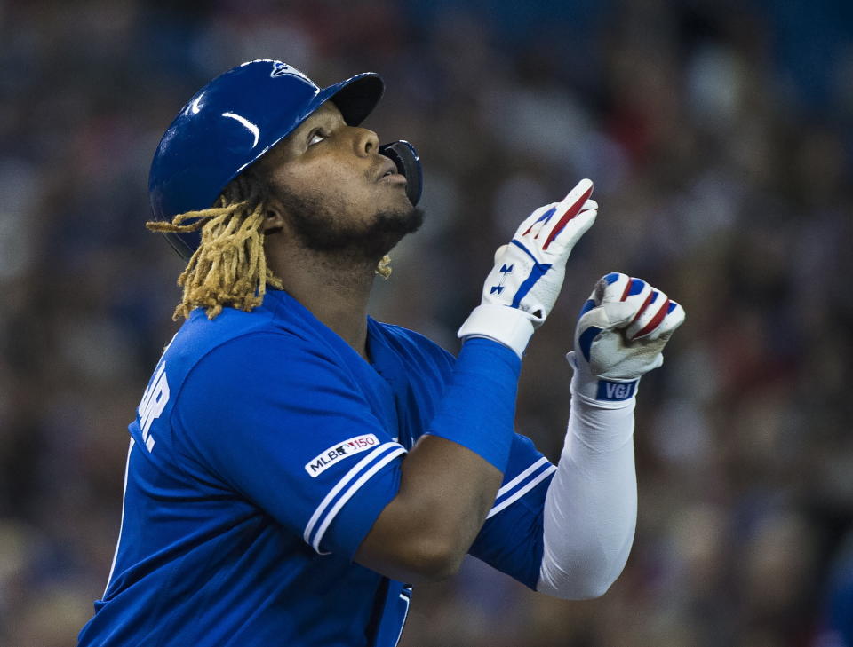 CORRECTS OPPONENT TO CHICAGO WHITE SOX, NOT DETROIT TIGERS -Toronto Blue Jays' Vladimir Guerrero Jr. reacts after drawing a walk in the third inning of a baseball game against the Chicago White Sox in Toronto on Saturday, May 11, 2019. (Nathan Denette/The Canadian Press via AP)